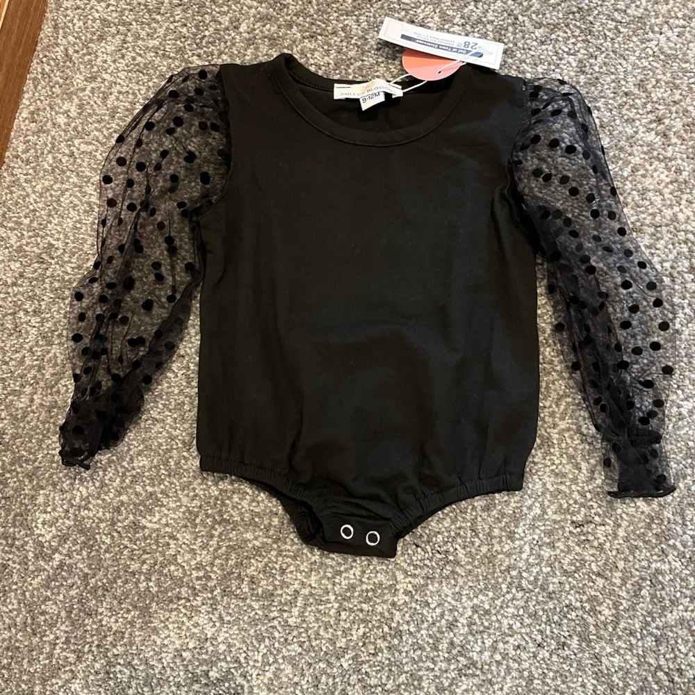 NWT
Black 9-12 months onsie
Bailey Blossom